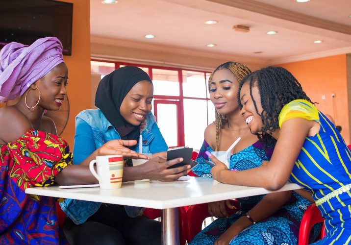 happy-african-girls-using-internet-min